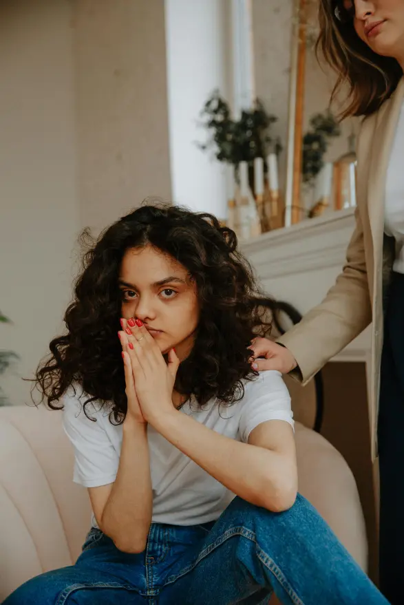 A young woman pondering about the journey of essentialism