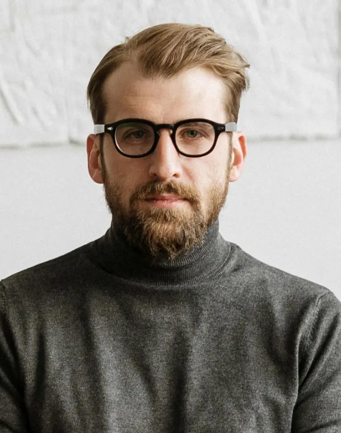 Wayne Thomas, a sharp man with glasses