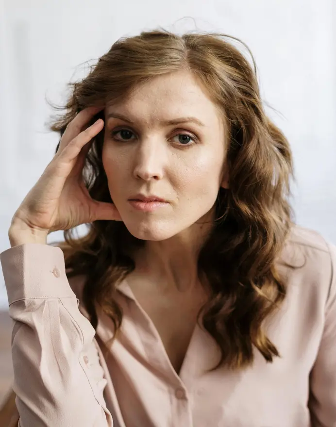 Emma Murphy, an elegant woman deep in thought